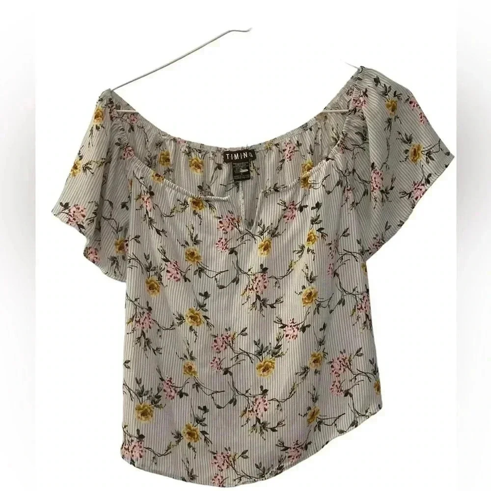 Off-the-shoulder  floral crop top​